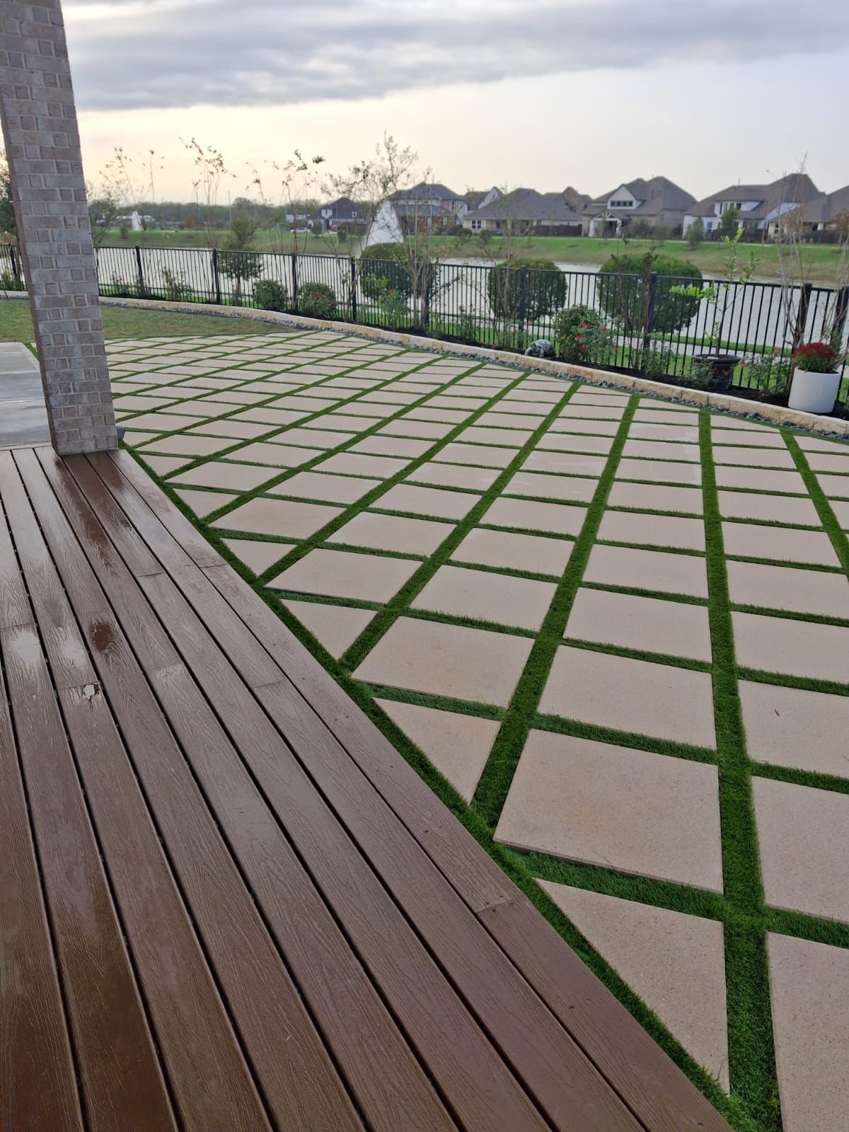 concrete tiles and deck in backyard